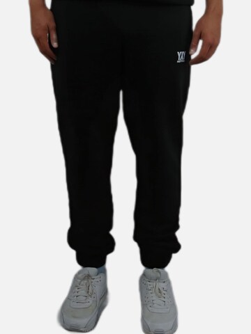 HEFTYKA Regular Sporthose‌ in Schwarz