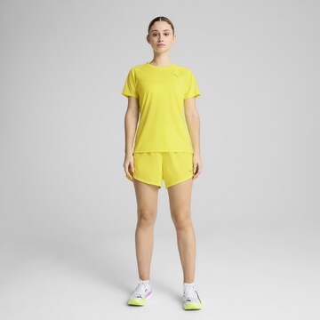 PUMA Functioneel shirt 'Velocity' in Geel