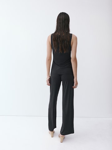 MANGO - Jumpsuit 'FIRA' en negro