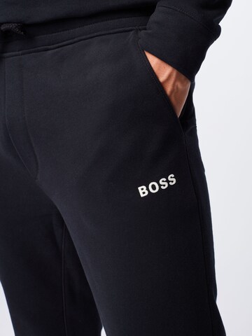 BOSS Orange Tapered Housut 'Skeefast' värissä musta