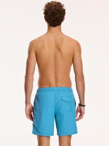 Shiwi Kratke kopalne hlače 'NICK' | modra barva