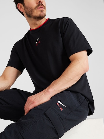 Nike Sportswear Ozke Kargo hlače 'AIR' | črna barva