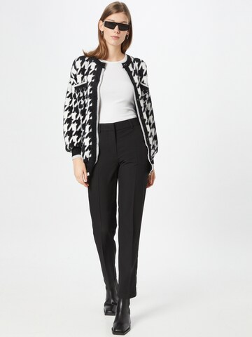 Cardigan dimensiuni mari de la River Island pe negru