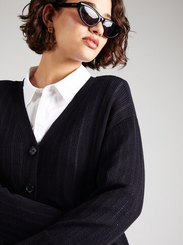 Vero Moda Curve Πλεκτή ζακέτα 'VMCNew Lexsun' σε μαύρο