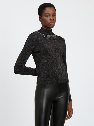 Influencer Pullover in Schwarz: Vorderseite