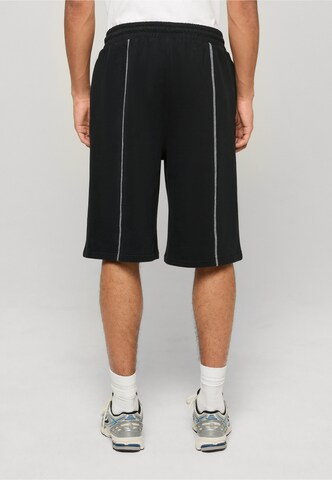 Urban Classics - Loosefit Pantalón en negro