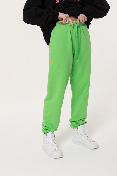 ET Nos Pantalon de sport en vert fluo, Vue avec produit