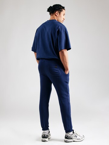 ALPHA INDUSTRIES Tapered Nadrág - kék
