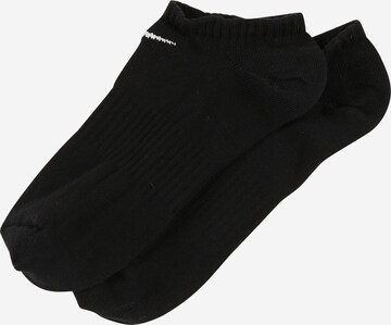 NIKE Athletic Socks in Black: front