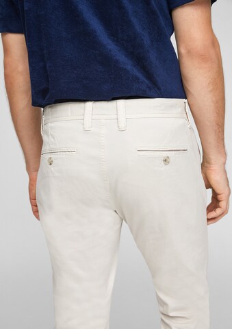 s.Oliver - Slimfit Pantalón chino 'Austin' en blanco