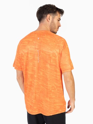 T-Shirt fonctionnel Spyder en orange