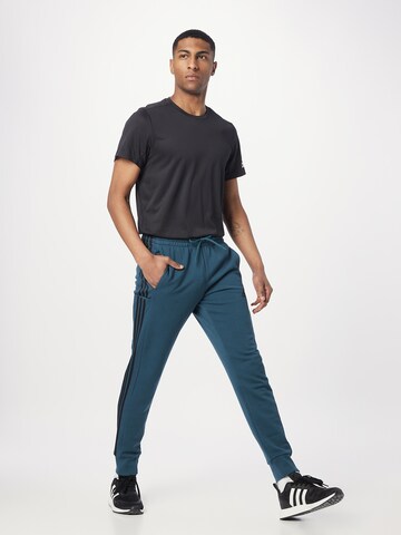 Effilé Pantalon de sport 'Essentials' ADIDAS SPORTSWEAR en bleu