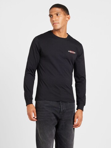 T-Shirt 'American Tradition' GUESS en noir : devant