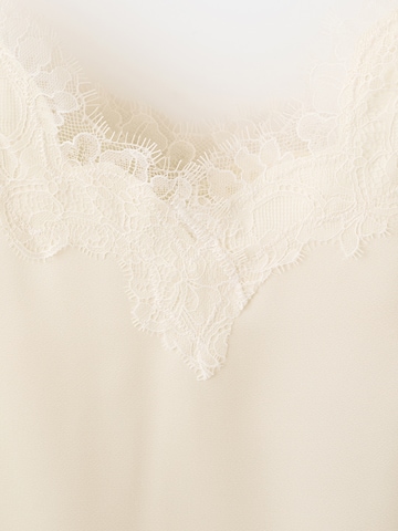 Top 'Tity' de la MANGO pe bej