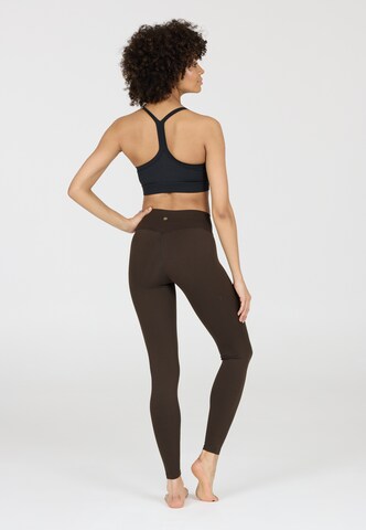 Athlecia Skinny Tights 'Luxe' in Braun