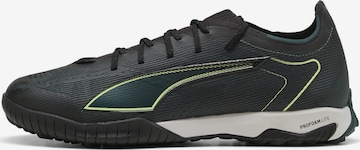 Chaussure de foot 'Ultra 6 Pro Cage' PUMA en noir : devant