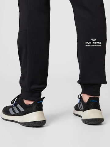 THE NORTH FACE Tapered Παντελόνι φόρμας σε μαύρο