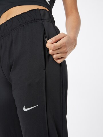 NIKE Tapered Workout Pants in Black