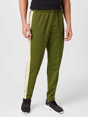 Regular Pantalon de sport NIKE en vert : devant