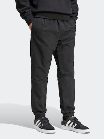 Tapered Pantaloni sport 'SL 2' de la ADIDAS SPORTSWEAR pe negru: față