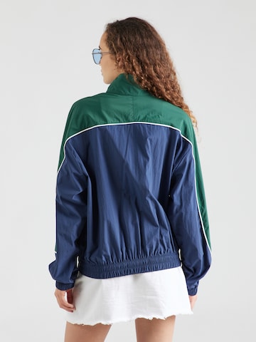 Veste de sport 'Greatest Hit' new balance en bleu