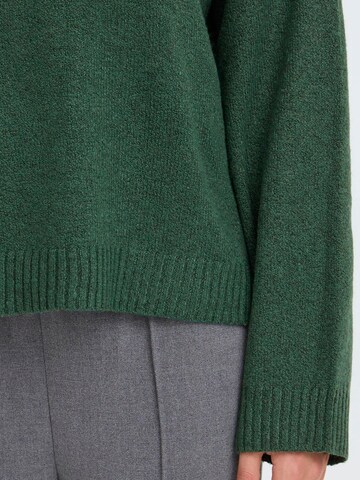 Oxmo Sweatshirt ' OXICOMOS ' in Groen