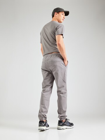 Effilé Pantalon Champion Authentic Athletic Apparel en gris