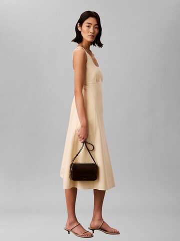 Calvin Klein Crossbody Bag in Brown: front