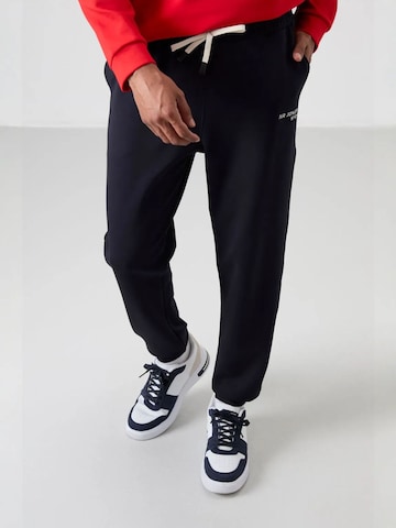 Tommy Life Joggingpak in Rood