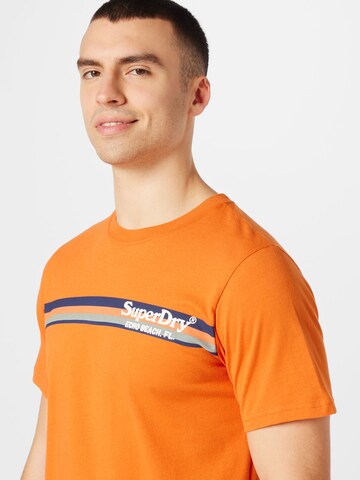 Superdry Koszulka w kolorze pomarańczowy