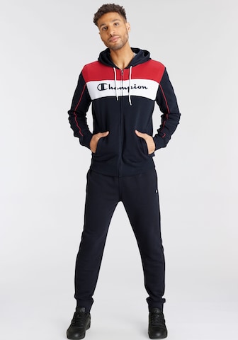 Champion Authentic Athletic Apparel Tracksuit in Blue: front