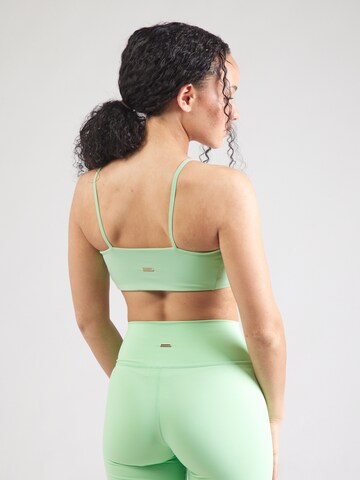 Bustino Reggiseno sportivo 'Bloom' di Athlecia in verde
