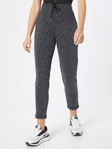 PUMA Tapered Sportbroek in Grijs: voorkant