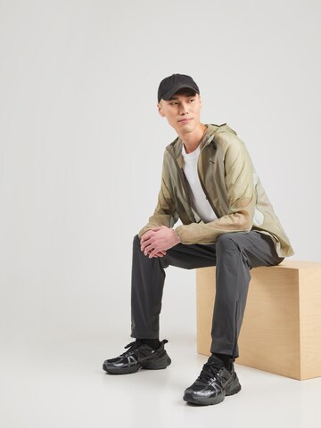 Nike Sportswear Between-season jacket 'TRAIL AIREEZ' in Green