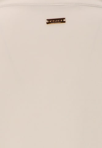 Athlecia Performance shirt 'Carley' in Beige