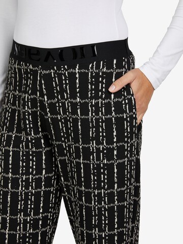 SEEYOU BY BIGGI M. Regular Pants in Black