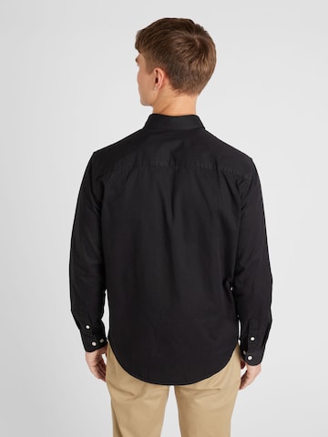 minimum جينز مضبوط قميص 'Prollo' بلون أسود