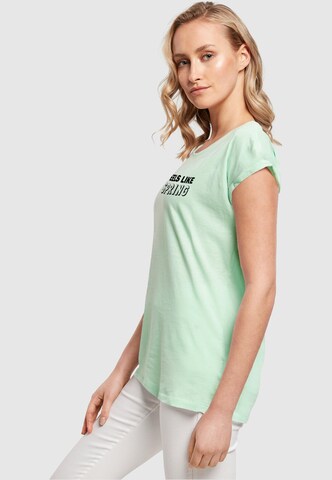 T-shirt 'Spring - Feels like' Merchcode en vert