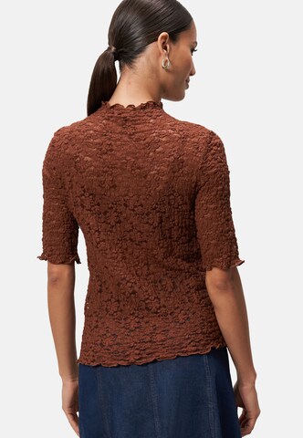 Top di zero in marrone