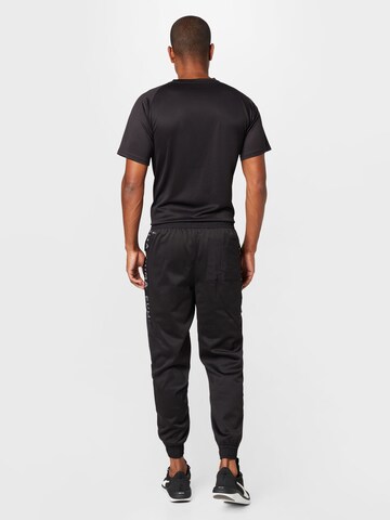 PUMA Tapered Sporthose in Schwarz