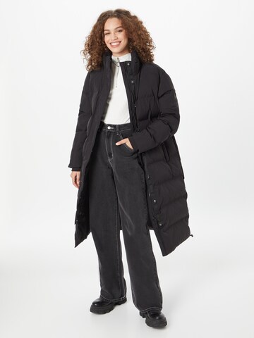 Manteau fonctionnel 'Train' Superdry en noir