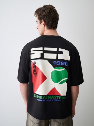 T-Shirt Next en noir : devant