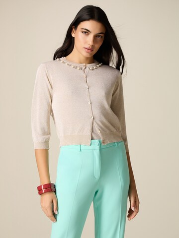 Cardigan oltre en or