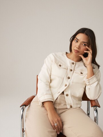 Next Tussenjas in Beige