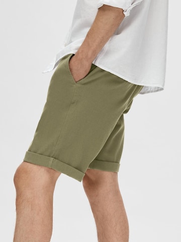 Coupe slim Pantalon chino 'LUTON' SELECTED HOMME en vert