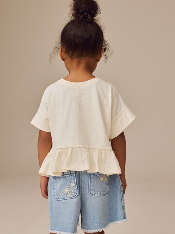 T-Shirt Next en blanc
