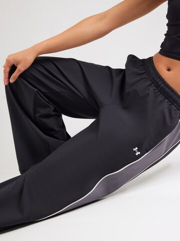 UNDER ARMOUR Loosefit Sportsbukser 'Rival Swoven' i sort