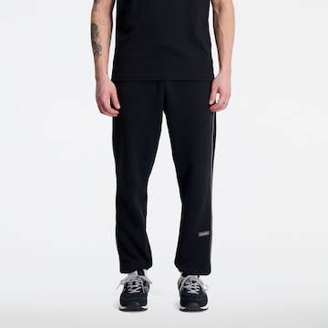 Pantalon de sport 'Essentials Winter Pant' new balance en noir : devant