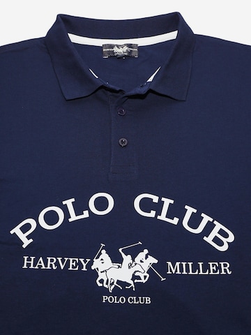 HARVEY MILLER Poloshirt in Blau