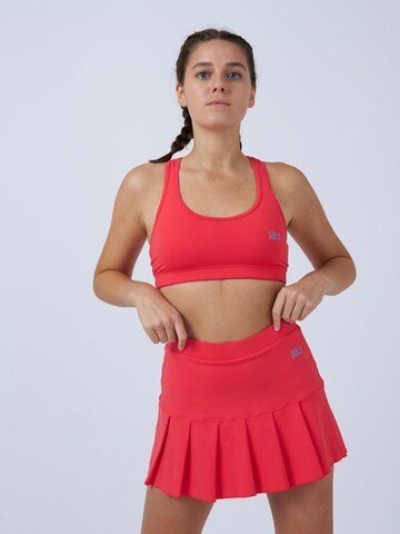 SPORTKIND Sportrok 'Pleated Skirt' in Oranje: voorkant